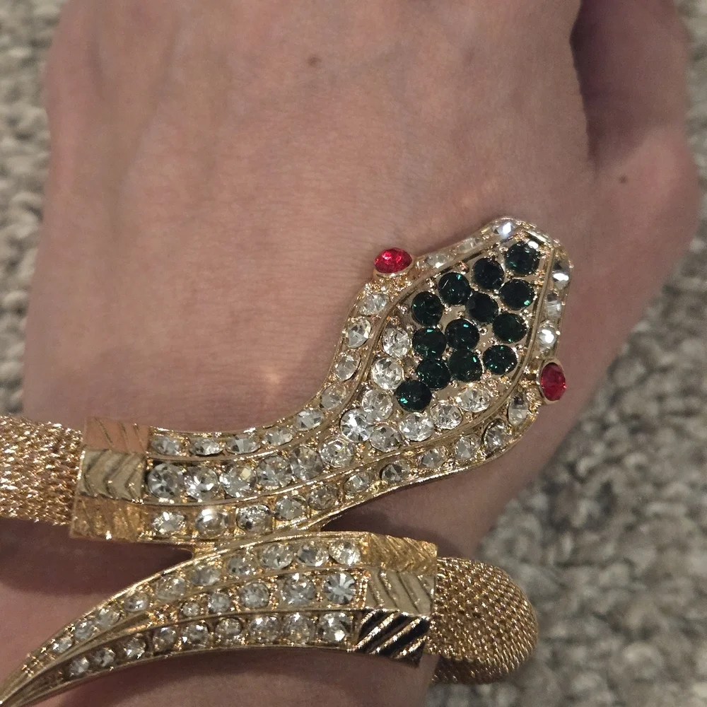 Elegant Gold Snake Bracelet with Green and Red Accents